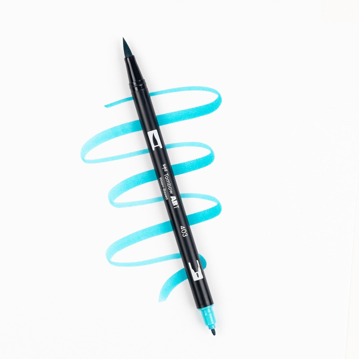 Black dual brush pen with blue ink on a white background